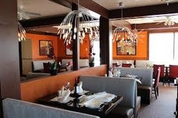 Imagen del bar/restaurante del Hotel Roomba Inn and Suites. Foto 2