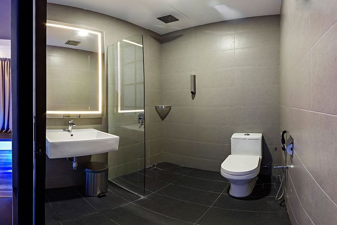 Imagen de la habitación del Hotel Roomies Suites. Foto 5