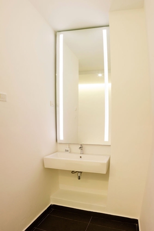 Imagen de la habitación del Hotel Roomies Suites. Foto 6