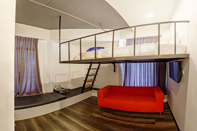 Imagen de la habitación del Hotel Roomies Suites. Foto 7