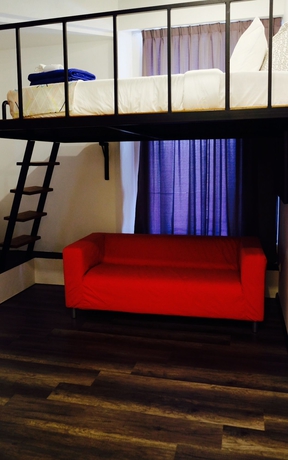Imagen de la habitación del Hotel Roomies Suites. Foto 8
