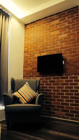 Imagen de la habitación del Hotel Roomies Suites. Foto 9