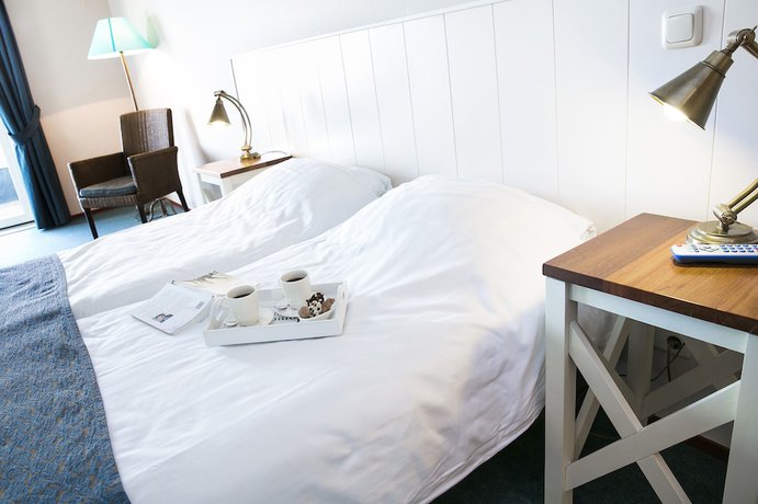 Imagen de la habitación del Hotel Roompot Beachhotel Cape Helius. Foto 17