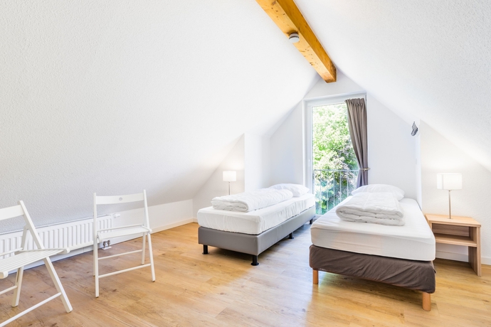 Imagen de la habitación del Hotel Roompot Bergresort Winterberg. Foto 7