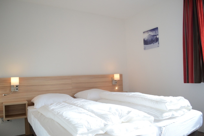 Imagen de la habitación del Hotel Roompot Bergresort Winterberg. Foto 8