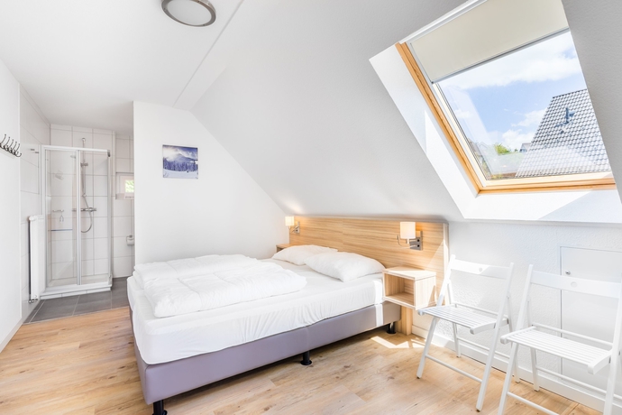 Imagen de la habitación del Hotel Roompot Bergresort Winterberg. Foto 9