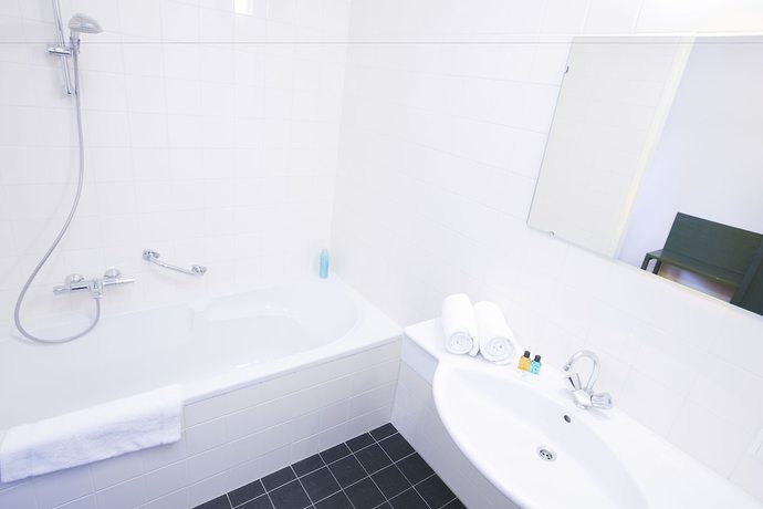 Imagen de la habitación del Hotel Roompot Marinapark Volendam. Foto 9