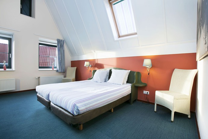 Imagen de la habitación del Hotel Roompot Marinapark Volendam. Foto 11