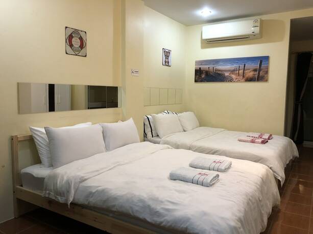 Imagen de la habitación del Hotel Roomquest One Bangsaray. Foto 23