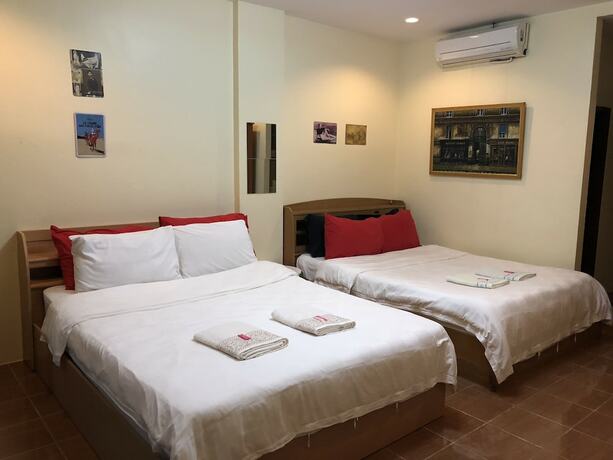 Imagen de la habitación del Hotel Roomquest One Bangsaray. Foto 26