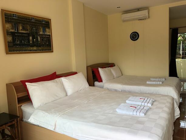 Imagen de la habitación del Hotel Roomquest One Bangsaray. Foto 35