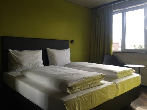 Imagen de la habitación del Hotel Roomreich, Ingolstadt. Foto 8