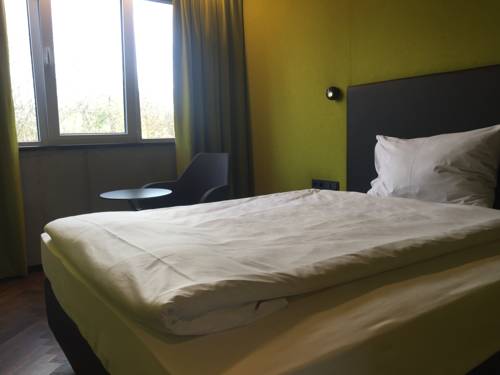 Imagen de la habitación del Hotel Roomreich, Ingolstadt. Foto 9