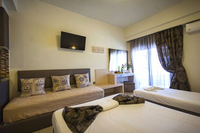 Imagen de la habitación del Hotel Rooms Amalthea Mare and Cafe - Bistro. Foto 10