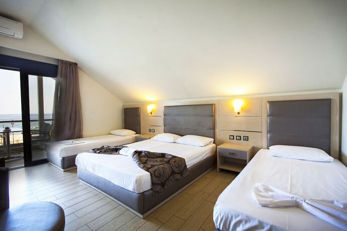 Imagen de la habitación del Hotel Rooms Amalthea Mare and Cafe - Bistro. Foto 11