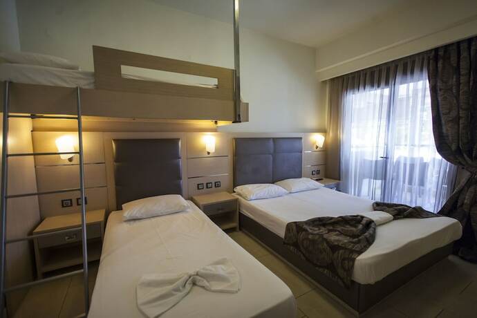 Imagen de la habitación del Hotel Rooms Amalthea Mare and Cafe - Bistro. Foto 15