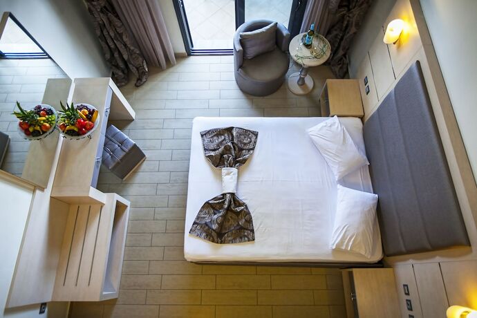 Imagen de la habitación del Hotel Rooms Amalthea Mare and Cafe - Bistro. Foto 18