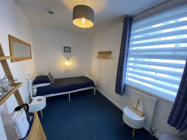 Imagen de la habitación del Hotel Rooms At Babbacombe. Foto 11