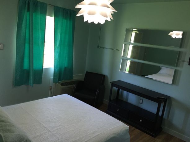 Imagen de los exteriores del Hotel Rooms At The Pecan. Foto 9