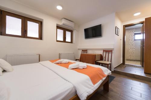 Imagen general del Hotel Rooms Gat. Foto 1