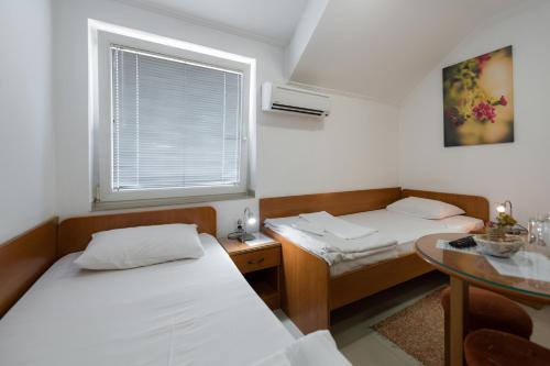Imagen de la habitación del Hotel Rooms Gat. Foto 8