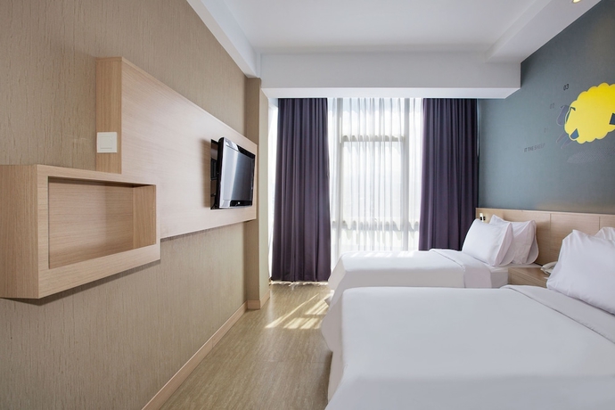 Imagen de la habitación del Hotel Rooms Inc Btc Bandung. Foto 4