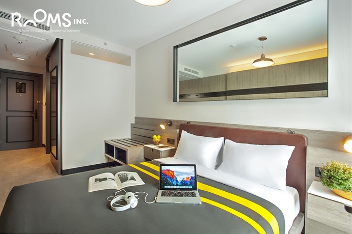 Imagen de la habitación del Hotel Rooms Inc Semarang. Foto 12