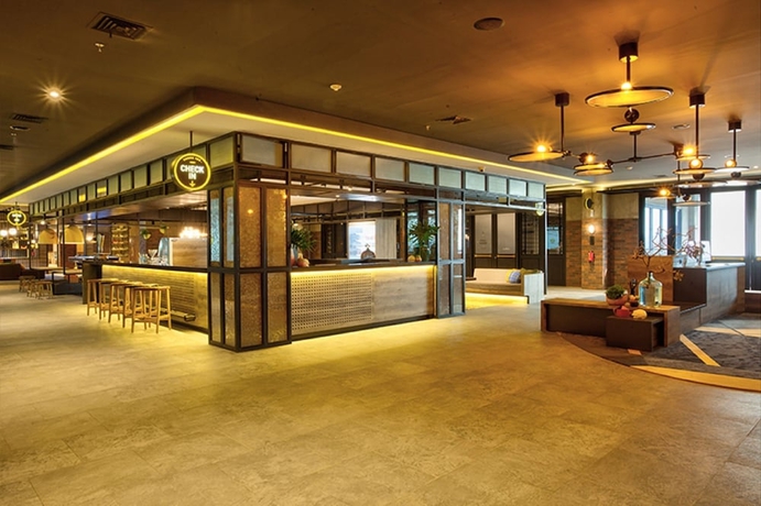 Imagen de los interiores del Hotel Rooms Inc Semarang. Foto 17