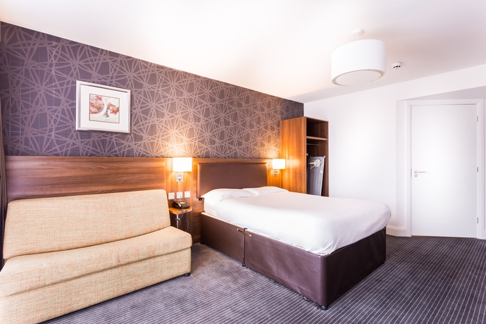 Imagen de la habitación del Hotel Rooms Inn. Foto 6