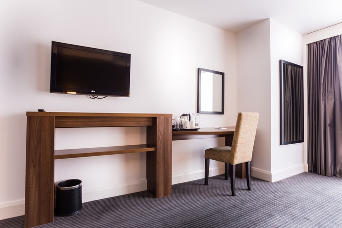 Imagen de la habitación del Hotel Rooms Inn. Foto 12