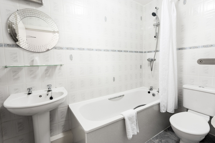 Imagen de la habitación del Hotel Rooms Inn. Foto 13