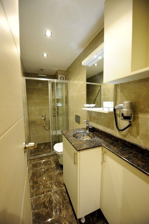 Imagen de la habitación del Hotel Rooms Inn Taxim. Foto 7