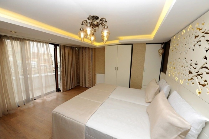 Imagen de la habitación del Hotel Rooms Inn Taxim. Foto 8