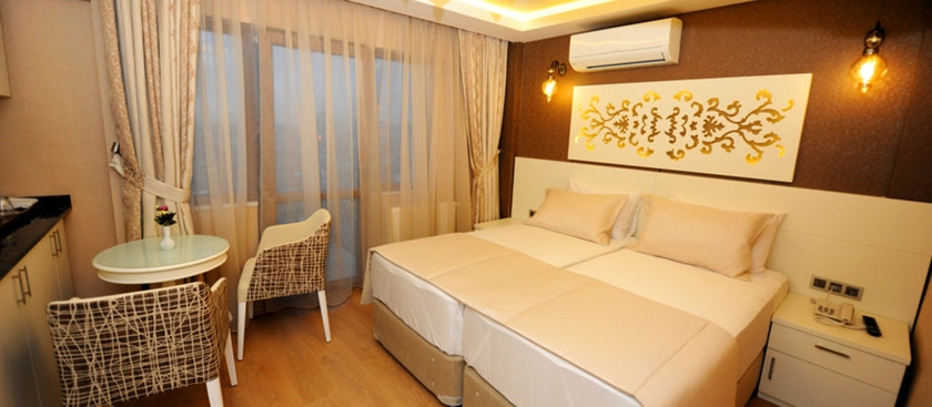 Imagen de la habitación del Hotel Rooms Inn Taxim. Foto 9
