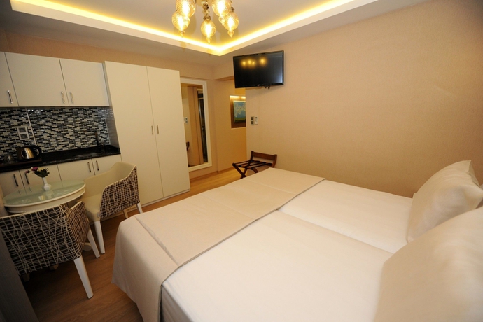 Imagen de la habitación del Hotel Rooms Inn Taxim. Foto 10