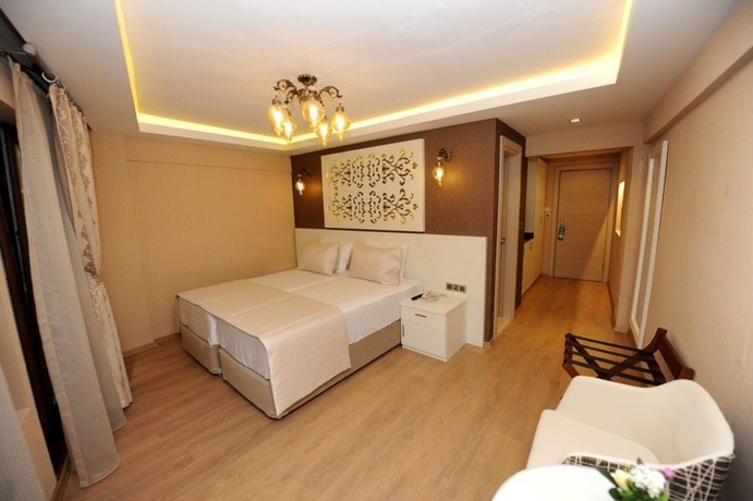 Imagen de la habitación del Hotel Rooms Inn Taxim. Foto 11