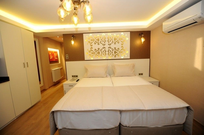 Imagen de la habitación del Hotel Rooms Inn Taxim. Foto 12