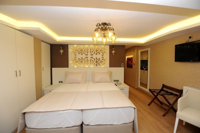 Imagen de la habitación del Hotel Rooms Inn Taxim. Foto 14