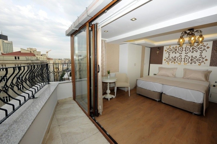 Imagen de la habitación del Hotel Rooms Inn Taxim. Foto 15