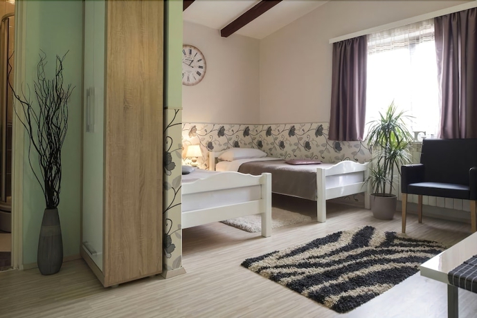 Imagen de la habitación del Hotel Rooms Madison. Foto 9