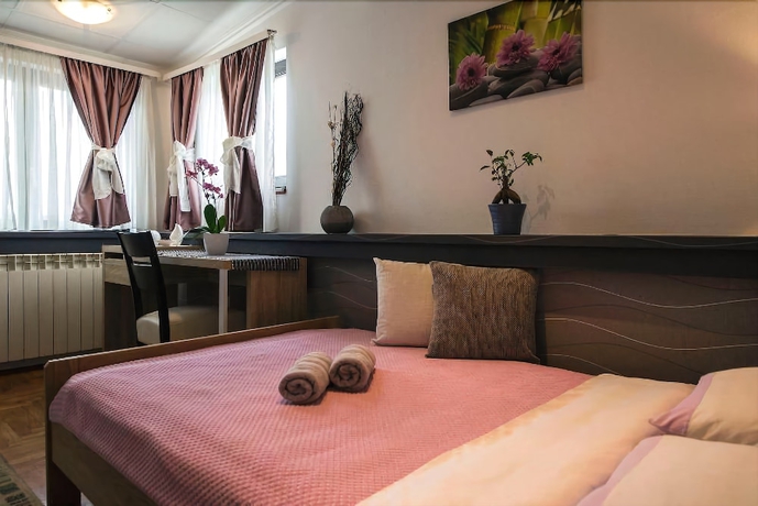 Imagen de la habitación del Hotel Rooms Madison. Foto 10