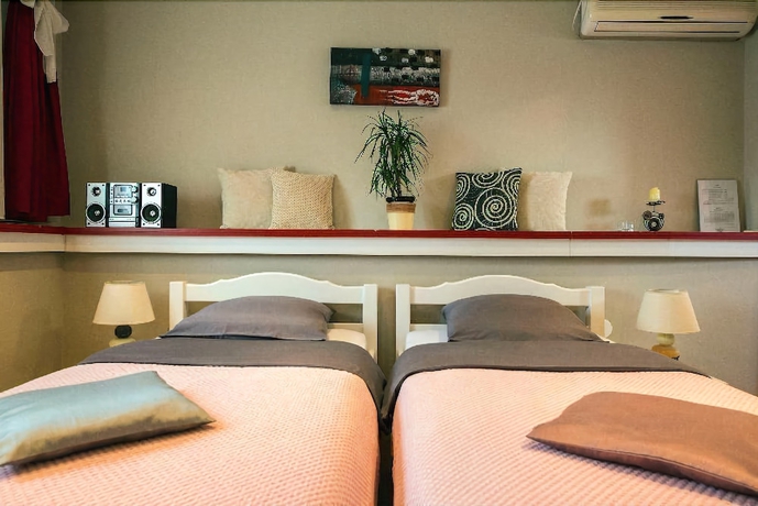 Imagen de la habitación del Hotel Rooms Madison. Foto 16