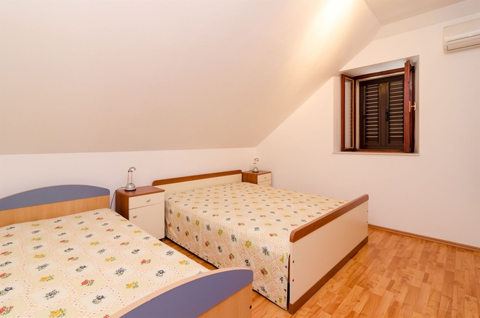 Imagen de la habitación del Hotel Rooms Mozara. Foto 10