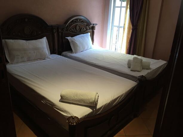 Imagen de la habitación del Hotel Rooms Palace. Foto 18