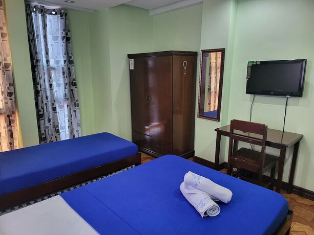 Imagen de la habitación del Hotel Rooms R Us - Voyagers Palace. Foto 11