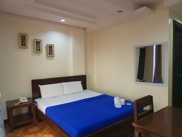 Imagen de la habitación del Hotel Rooms R Us - Voyagers Palace. Foto 14