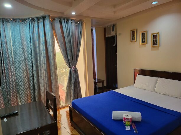 Imagen de la habitación del Hotel Rooms R Us - Voyagers Palace. Foto 16