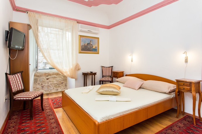 Imagen de la habitación del Hotel Rooms Vicelic Guest House. Foto 4