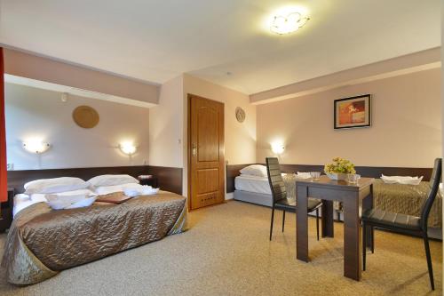 Imagen de la habitación del Hotel Rooms & Apartments POLARIS - centrum Zdrojowe Pienin. Foto 8