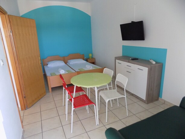 Imagen de la habitación del Hotel Rooms and Apartments Galeb. Foto 22